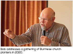 Bob addresses a gathering